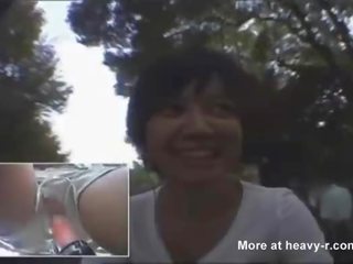 Asian mistress rides fuck bike outdoors