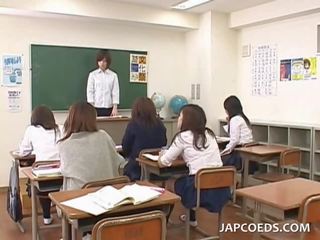 Jap school cuties undressed and cunt checked in group