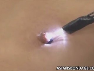Asian babe bond and fuckd by a fucking machine